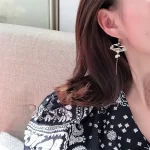 Asymmetric hollow-out Fan and Crane Dangle Earring-2