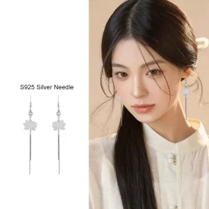 White Lotus Earrings With Silver Tassels